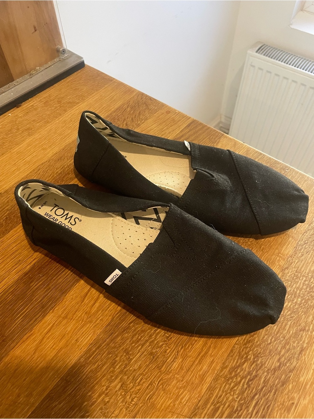 TOMS Women’s Classic Slip-On Shoes in Black